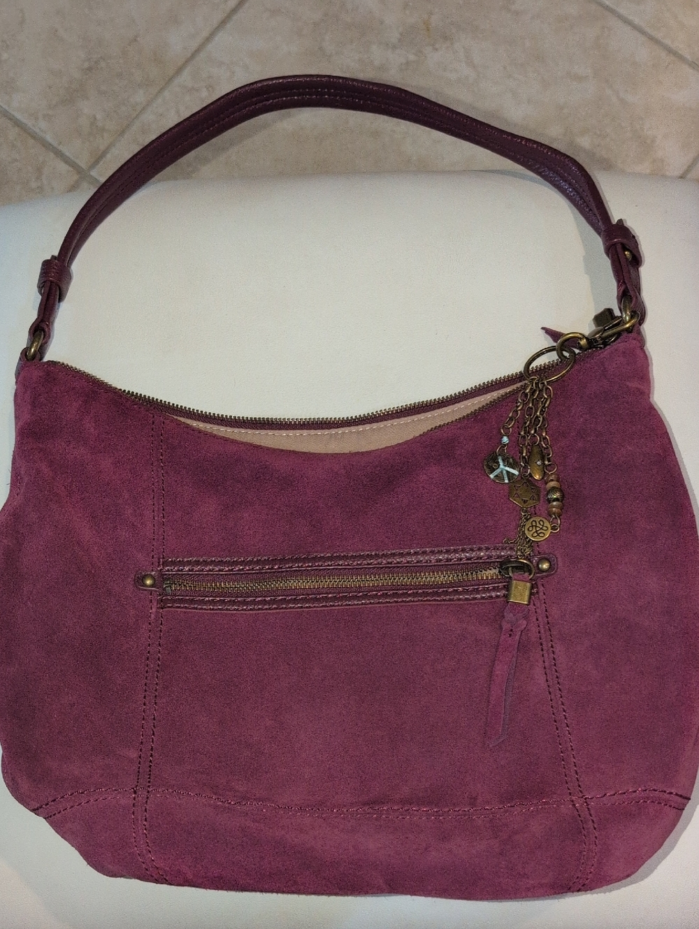 The Sak Plum Suede Shoulder Bag with Sak Keychain/ Bag charm